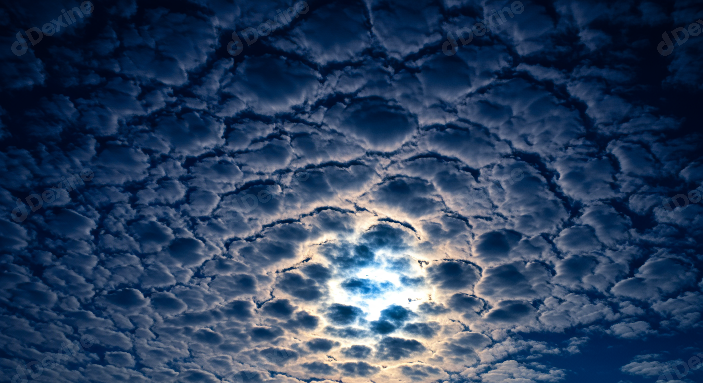 Dramatic Altocumulus Cloud Pattern With Radiant Sky Glow