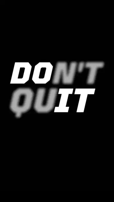 the words don't quit in white on a black background