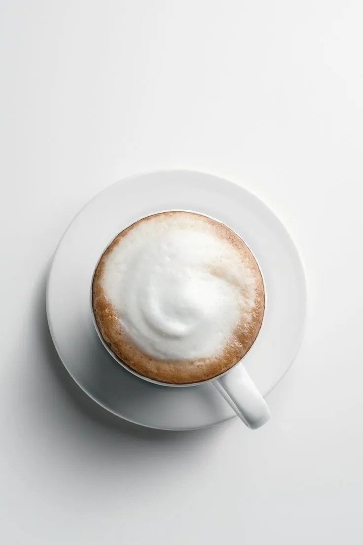 a cappuccino on a white saucer