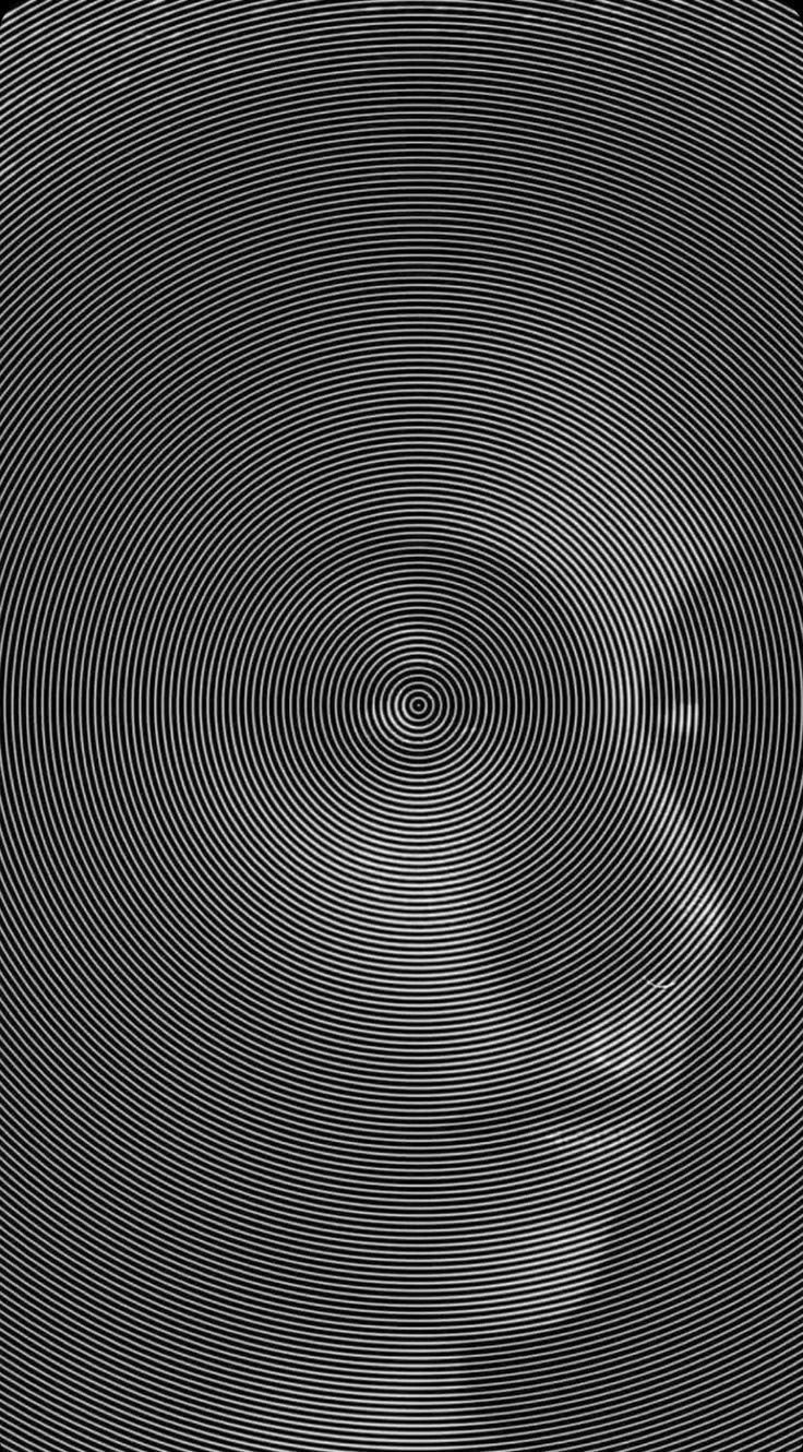 a black and white photo with lines in the shape of a woman's face