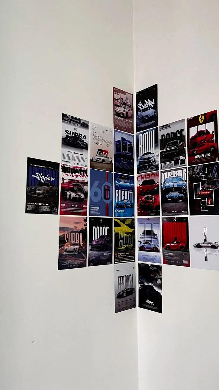 a white wall with many different cars on it's sides and pictures hanging from the walls