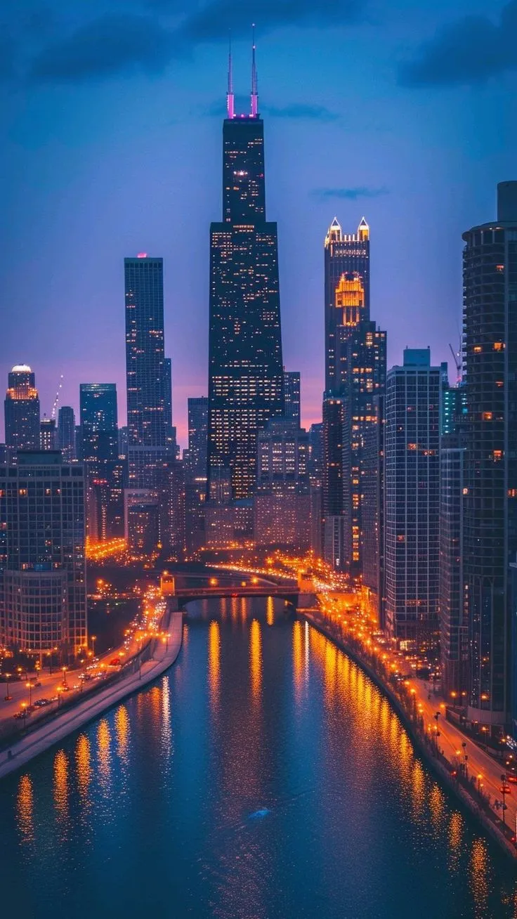 the city skyline is lit up at night with lights reflecting in the water and skyscrapers