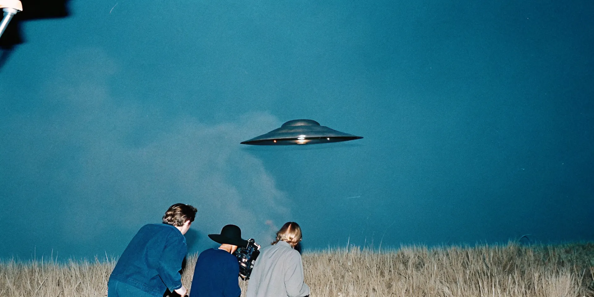 Pov of capturing abnormal phenomenon, metallic flying saucer, camouflaged behind...