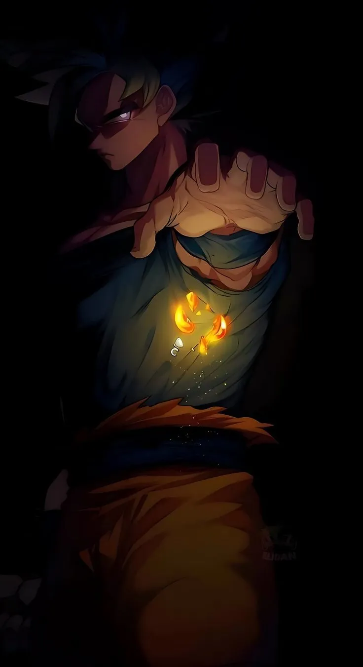 a man with his hands on his chest in the dark