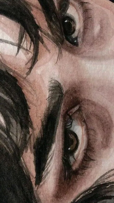 a drawing of a man's face with long hair