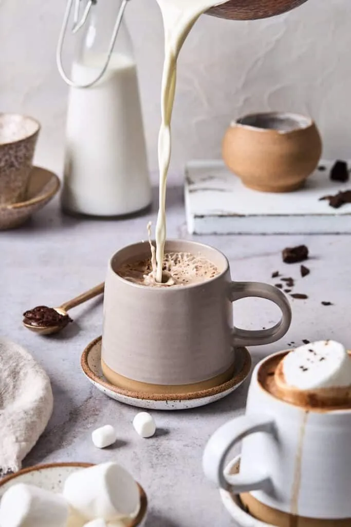 French hot chocolate is luxurious, smooth, and decadent! Made with fresh cream and flavorful chocolate, this Le Chocolat Chaud will transport you to the romantic streets of Paris with each sip! #hotchocolate #chocolate #hotcocoa #frenchhotchocolate