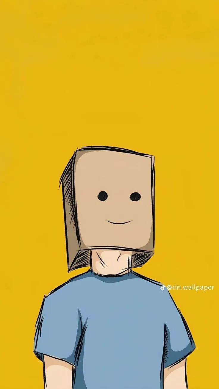 a person with a box on their head standing in front of a yellow wall and looking at the camera