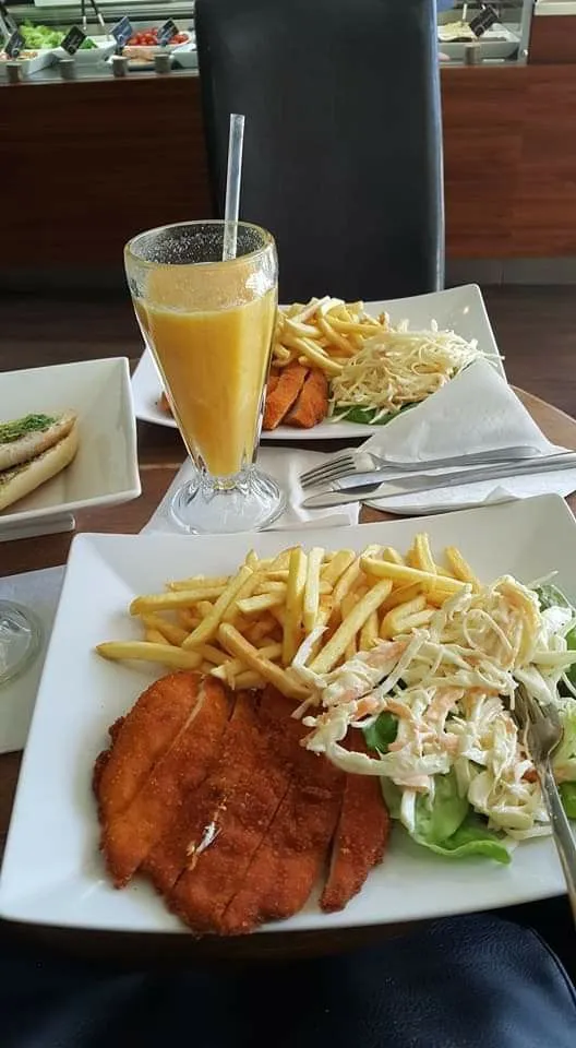 the meal is ready to be eaten on the table at the restaurant or take out