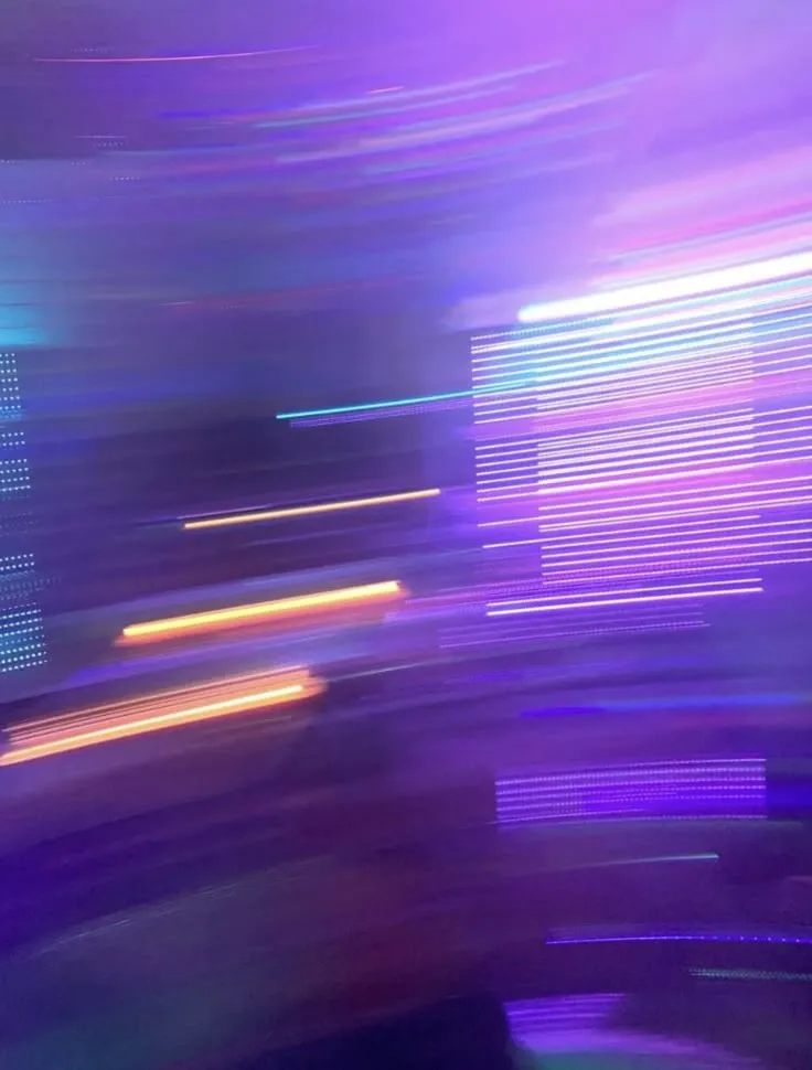 blurry photograph of colorful lights in the dark